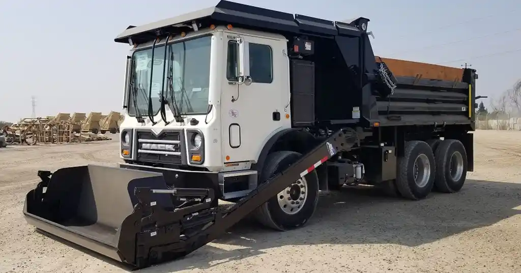 4. Jentera Pengangkut (Loaders and Dump Trucks)